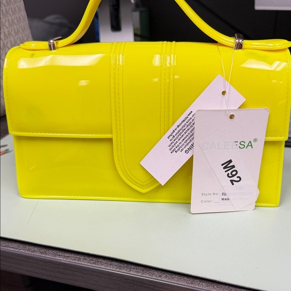 CALE Handbags - CALE Neon Yellow Clutch